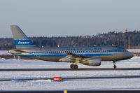 OH-LVE @ EFHK - Finnair A319 in retro colour scheme. Taken from inside Terminal 2