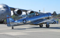N3269G @ KWVI - Mostly brushed aluminum North American SNJ-5 with U.S. Navy titles and red tail band taxiing @ 2010 Watsonville Fly-In - by Steve Nation