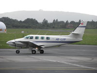 HB-LUV @ EGBJ - Taxiing into GLO - by Manxman