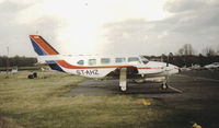 ST-AHZ @ EGTR - This Navajo languished at elstree for many years finally beong destroyed by fire in 1996 (scanned print| - by Andy Parsons