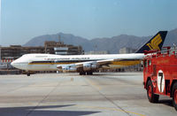 9V-SIA @ HKG - SIA B747 at HKG Kai Tak Airport 1977 - by Henk Geerlings