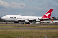 VH-OJP @ YSSY - Beginning of a long taxi for 16L - by Bill Mallinson