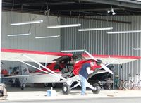 N153JM @ CCB - Parked in the hanger and being worked on - by Helicopterfriend