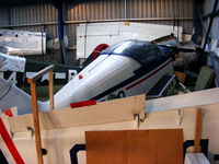 G-BBBO @ EGBD - stored in the main hangar - by Chris Hall
