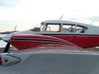N4462P @ KBVY - Wing view of 62P at Beverly Flight Center (KBVY). - by Samuel D.