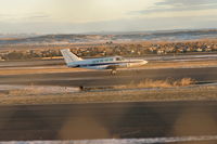 N2718Y @ KBIL - Cessna 402 taxi's to 28R Jan 21,2011