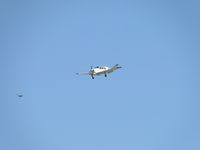 N5478U @ ONT - Appears to be flying parallel with one of the local hawks, on final to runway 26R - by Helicopterfriend