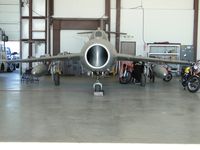 N17JL @ CNO - Parked in a hanger - by Helicopterfriend