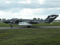 G-CVIX @ EGHH - Sea Vixen taxying past the Flying Club - by BIKE PILOT