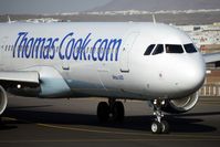 G-NIKO @ GCRR - Thos Cook 2000 Airbus A321-211, c/n: 1250 arrives at the holding point of Runway 03 - by Terry Fletcher