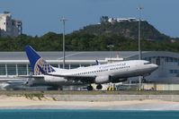 N13716 @ TNCM - Continental N13716 departing TNCM
