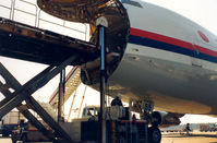 JA8165 @ NRT - JAL Cargo plane unloading at Narita , Nov '89 - by Henk Geerlings