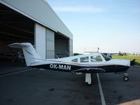 OK-MAN @ LKRO - In front of its roof - by SEB