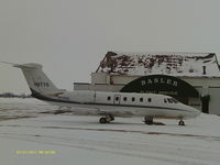 N877G @ KOSH - snowy cold Wisconsin winter ramp ops at Basler