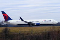 N187DN @ EGCC - Delta B767 lining up on RW05L - by Chris Hall