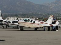 N7246Z @ POC - Appears to be a discussion between several people while ship is parked at Howard Aviation - by Helicopterfriend