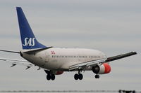 LN-RRZ @ EGCC - Scandinavian B737 on approach for RW05L - by Chris Hall