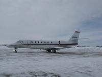 N323QS @ KOSH - staging through KOSH.Taken on the Orion FBO Ramp on a snowy winter day - by steveowen