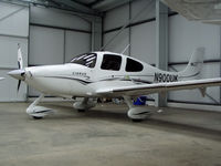N900UK @ EGBT - Parked in the Cirrus hangar - by N-A-S