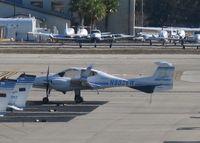 N902ER @ KDAB - ERAU Diamond DA-42 Twin Star on the flight line. - by Kreg Anderson
