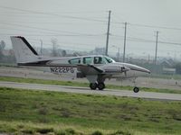 N222PG @ CNO - Landing on runway 26R - by Helicopterfriend