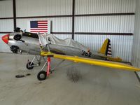 N56026 @ AJO - Parked in the hanger behind the Vultee has a tumbleweed visitor - by Helicopterfriend