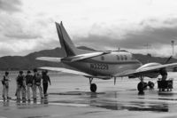 N32229 @ KAPV - B&W photo of The Flyin' Elvi getting ready to board N32229 to go do a demo somewhere.  Photo taken at Apple Valley Skydive sometime in the late 1990s. - by TimB