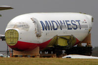 SU-MWC @ EGBP - Not much left now of 1999 Boeing Aircraft Co B737-683, c/n: 28303 - by Terry Fletcher
