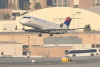 N457SW @ KLAX - SkyWest/Delta Connection Bombardier CL-600-2B19, SKW4787 departing RWY 25R KLAX enroute to KSAN. - by Mark Kalfas
