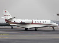 OE-GXL @ LSGG - Parked at the General Aviation area... - by Shunn311