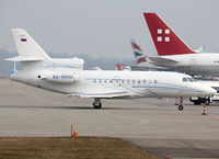 RA-09001 @ LSGG - Taxiing to the General Aviation area... - by Shunn311