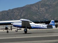 N8567H @ CCB - Just as the ship is lifting off, a strong gust of wind from the south picks up the wing - by Helicopterfriend