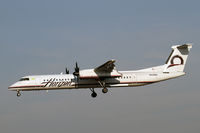 N428QX @ SEA - Landing on 34L - by Duncan Kirk