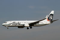 N577AS @ SEA - Landing on 34L - by Duncan Kirk