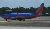 N429WN @ KMCO - Southwest Airlines Boeing 737-700 - by Kreg Anderson
