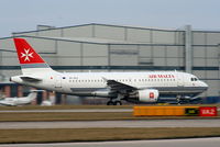 9H-AEG @ EGCC - Air Malta - by Chris Hall