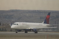 N609CZ @ KBIL - Delta Airlines Embraer departs Billings Logan on runway 28R