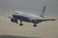 N483UA @ KBIL - United Airlines Airbus A320 arriving at Billings Logan against a south wind.