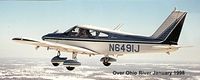 N6491J - Over KLOU - by Tom Payette