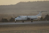 N114AX @ KBIL - Alpine Air Beech 1900 Freighter departing KBIL on 28R