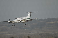 N520MC @ KBIL - King Air approaches 28R on a blustery day - by Daniel Ihde