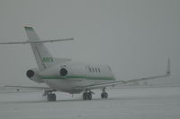 N189TM @ KBIL - BAE 125 in an old fashioned Montana snowstorm. - by Daniel Ihde