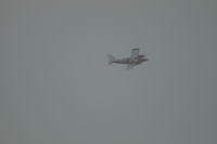 N300JT @ KBIL - Piper Seneca onward through the fog.