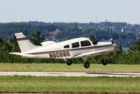 N8086G @ MGN - Departing RWY 28 - by Mel II