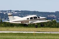 N8086G @ MGN - Departing RWY 28 - by Mel II