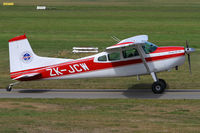 ZK-JCW @ NZCH - from the aero club balcony - by Bill Mallinson