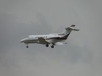 N356SR @ ONT - On final for 26 on a rainy, cloudy day - by Helicopterfriend