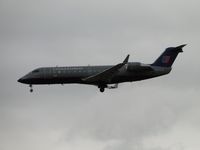 N967SW @ ONT - Sky West flying United Express on final t runway 26L - by Helicopterfriend
