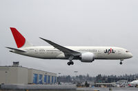 JA822J @ PAE - THis soon to be re-painted JAL B.787 is seen landing after its first test flight. Note that the test registration has been blown off in flight! - by Duncan Kirk