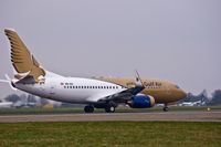 HB-IIQ @ NWI - HB-IIQ about to leave Norwich following spray into Gulf Air colour scheme for a lease period. - by Keith Newsome